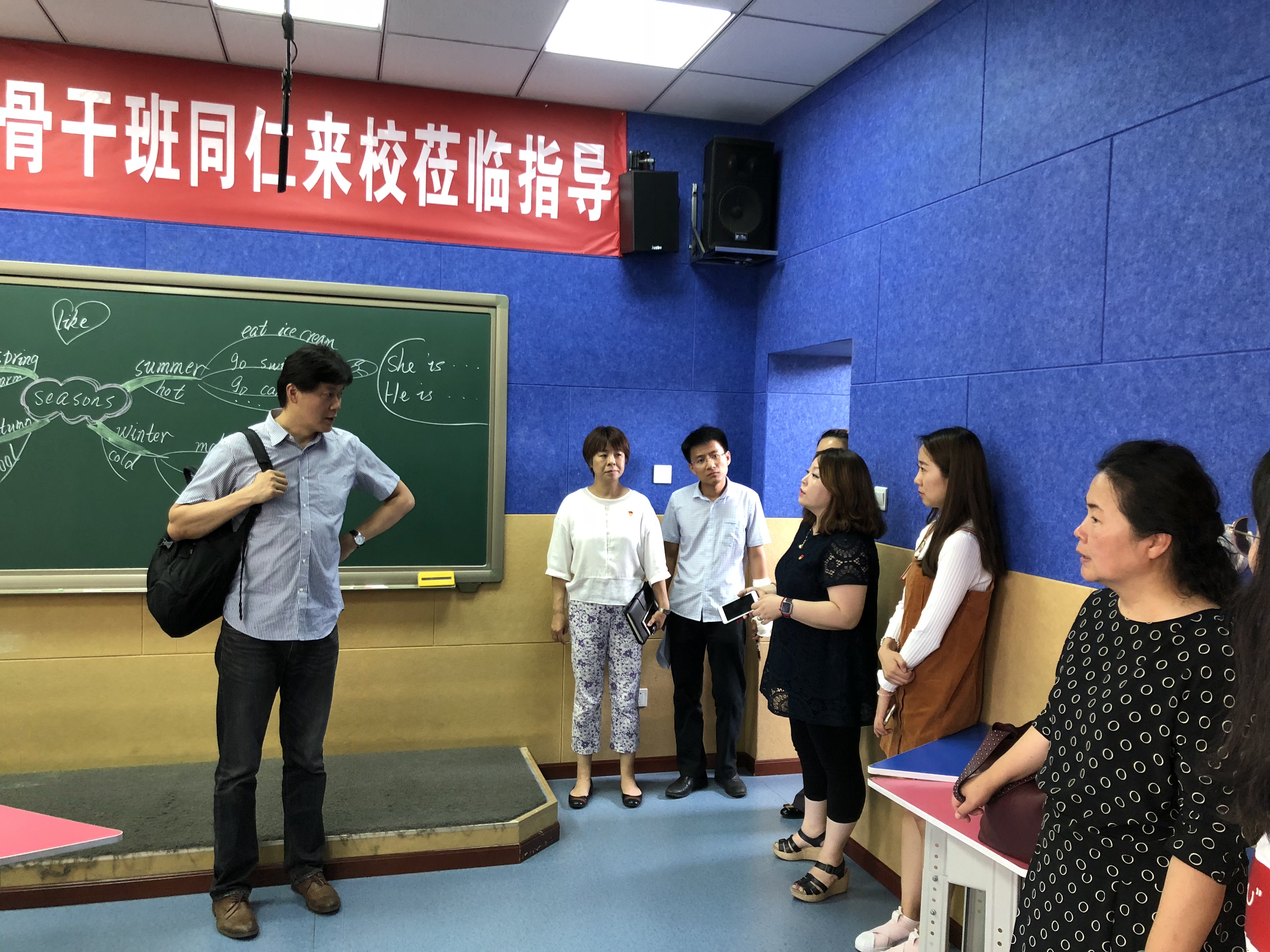  我院高益民教授和林杰教授赴石景山小学调研